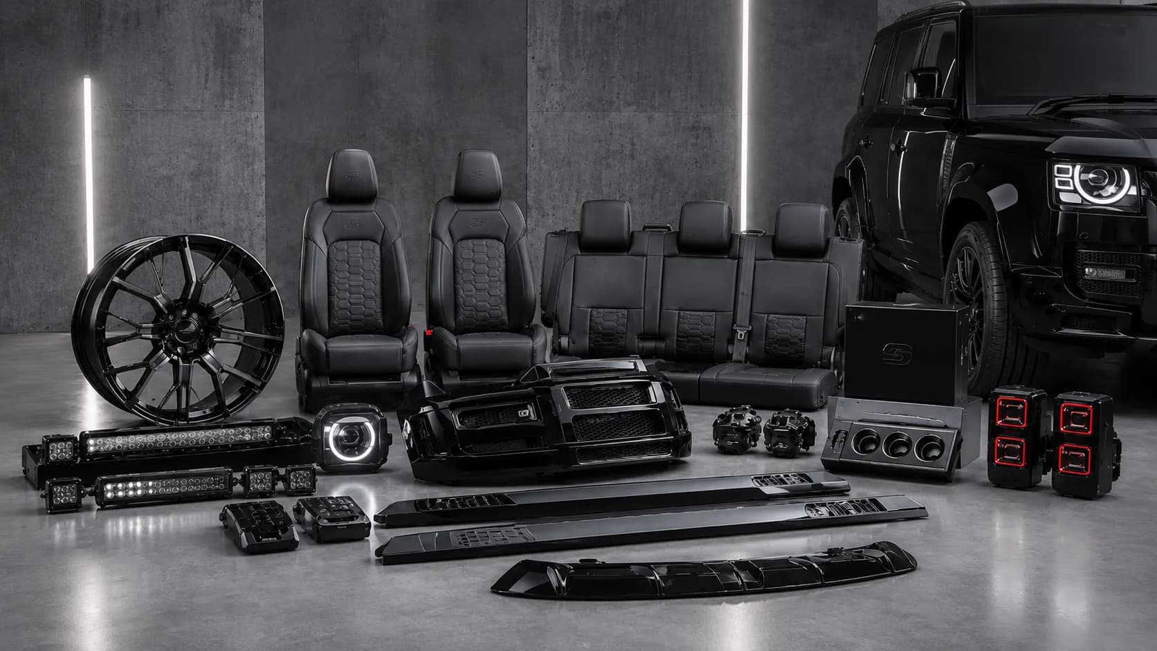 Sterling Defender parts, wheels and seats laid out in the studio