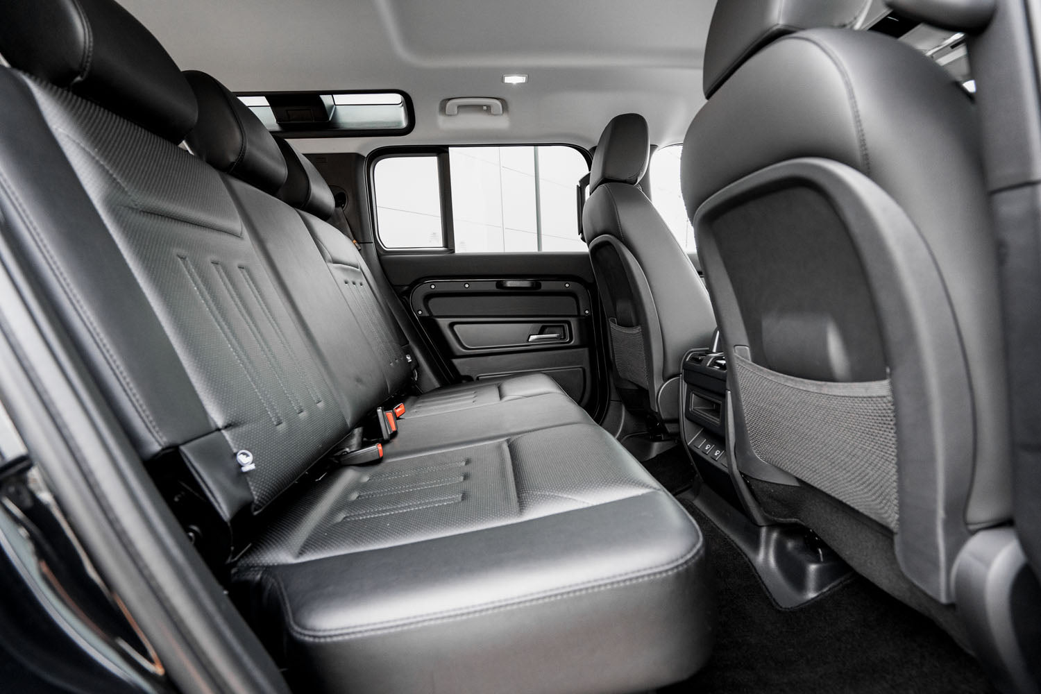 New Land Rover Defender rear seat conversion – Sterling Automotive Design